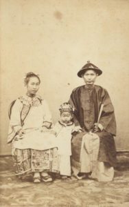 Ceremonial attire of a woman with simple "cloud collar” and a man without "Mandarin square”